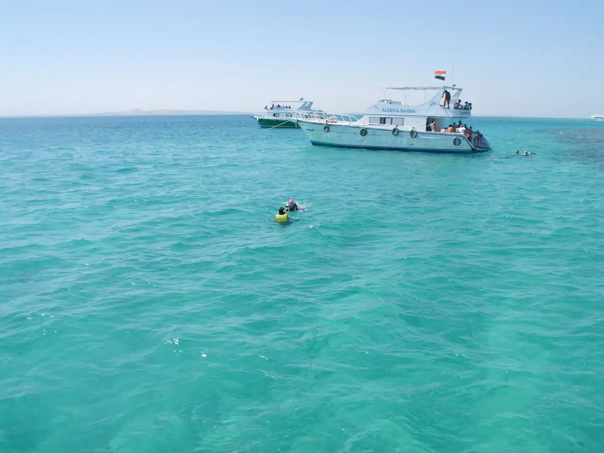 Excursion boat in turquoise water near Hurghada