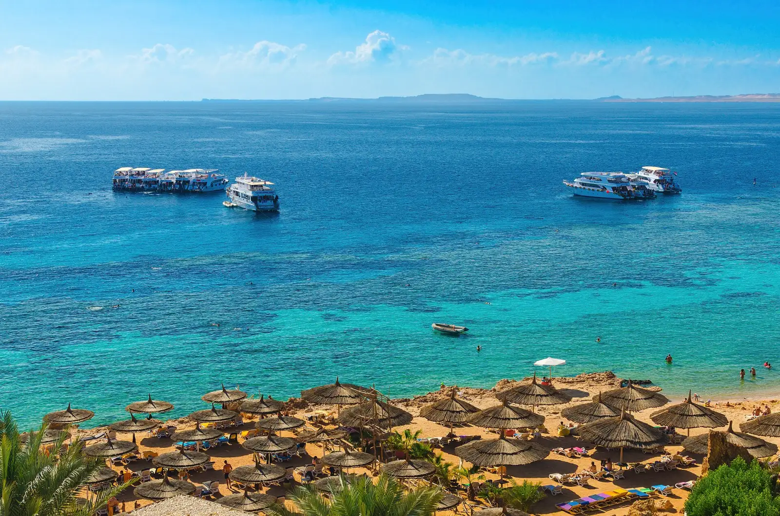 Turquoise water and golden beach at Ras Um Sid bay, Sharm El Sheikh