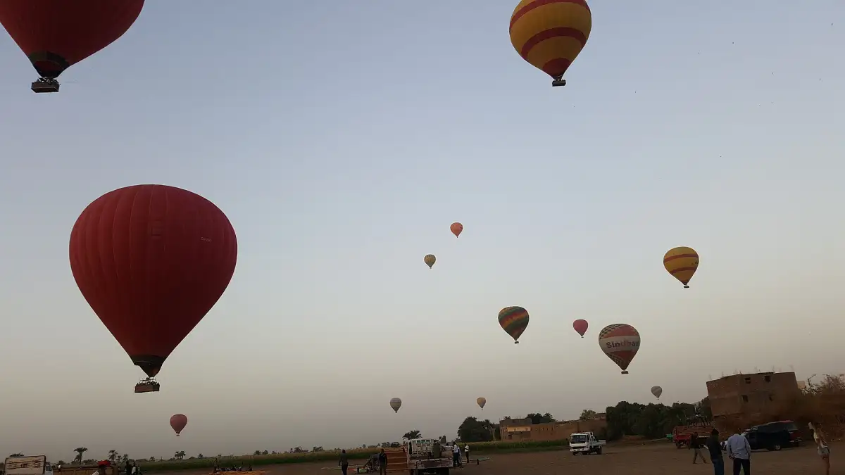 Balloons in the sky above Luxor at sunrise